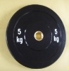 Solid rubber barbell disc