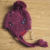 knitted hat with flap