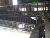 Raised edge conveyor belt