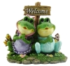 GCrden frogs holding welcome board