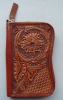 Hand carved leather wallets