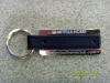 dog tag,badge,bottle opener,belt buckle,key chain