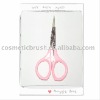 professional pink manicure scissor nail care