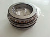 Double direction thrust angular contact bearing