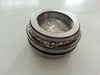 Double direction thrust angular contact bearing