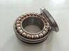 Double direction thrust angular contact bearing