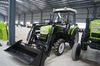 55HP 4WD farm tractor with right side 12F+4R shift,hydraulic steering,3points linkage,traction system,4 in 1 bucket